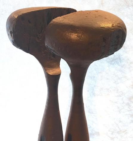 Image of the two round top pieces of &quot;Figur 82&quot; sculpture which appear to have been split apart from one another by Rudolf Hoflehner.