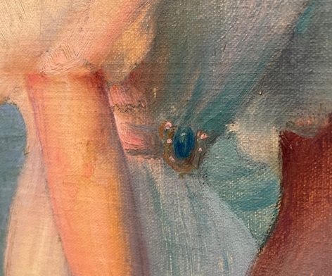 Close up image detail of the blue colored jeweled belt on the woman standing in the painting "On the Shore of Lake Erie".