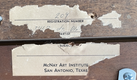 Image of label verso fragment from McNay Art Institute on &quot;The Magician&quot; painting by Julio De Diego.